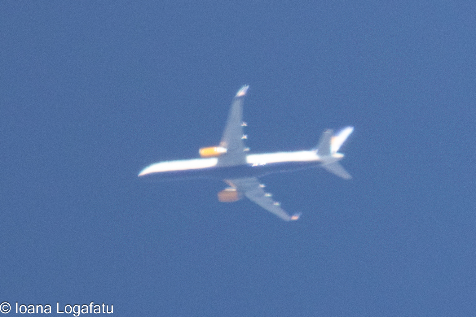 High above the clouds, a plane journeys onward